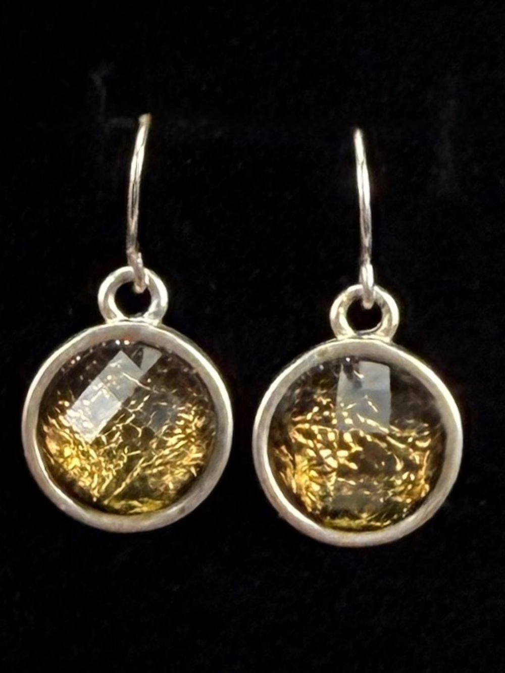 Beautiful, silvertone, deep olive green reflective pierced earrings